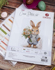 Cross Stitch Kit Luca - S - The Bunny's Surprise, B1409 - Luca - S Yarns
